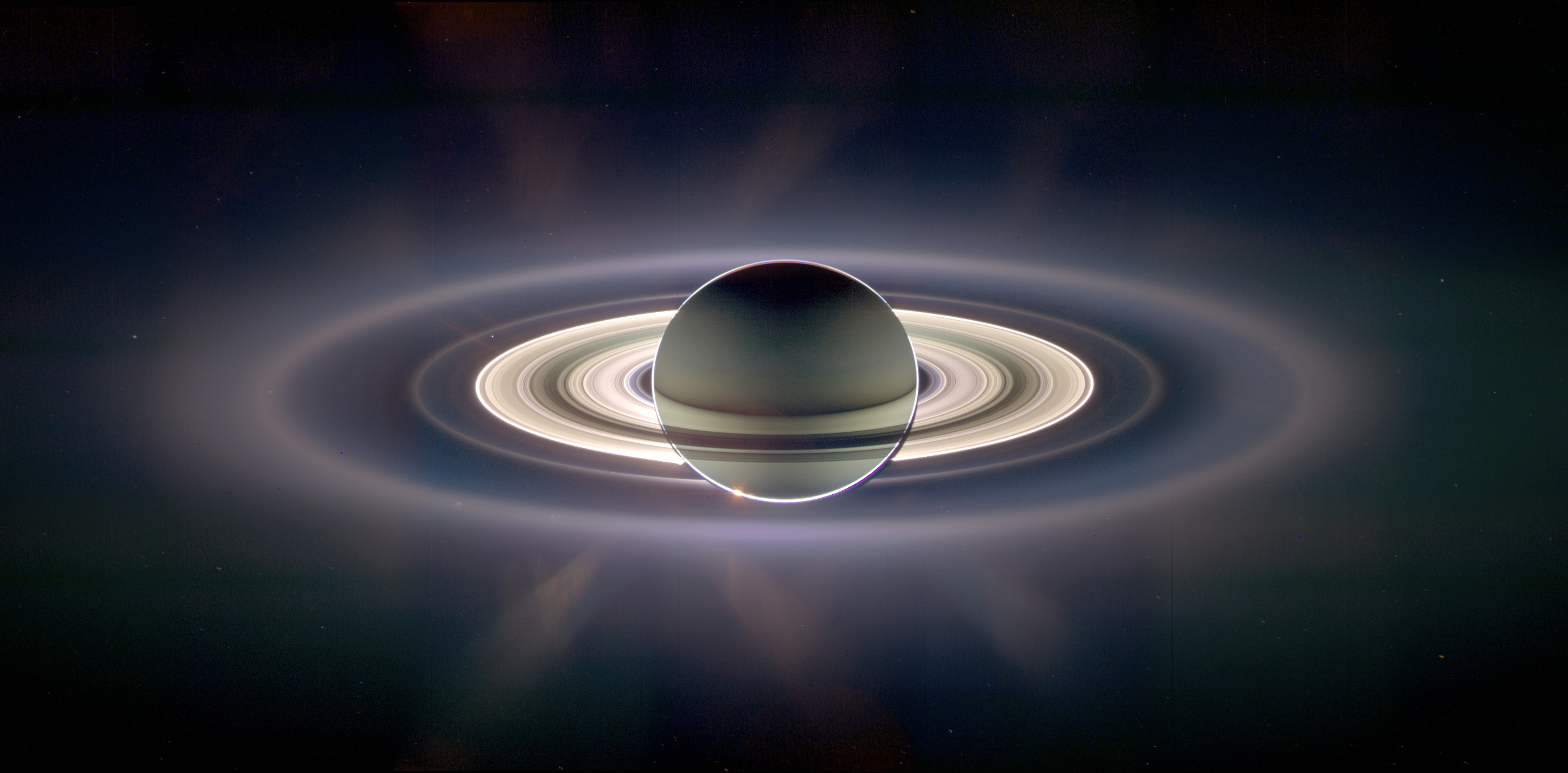 APOD: 2006 October 16 - In the Shadow of Saturn