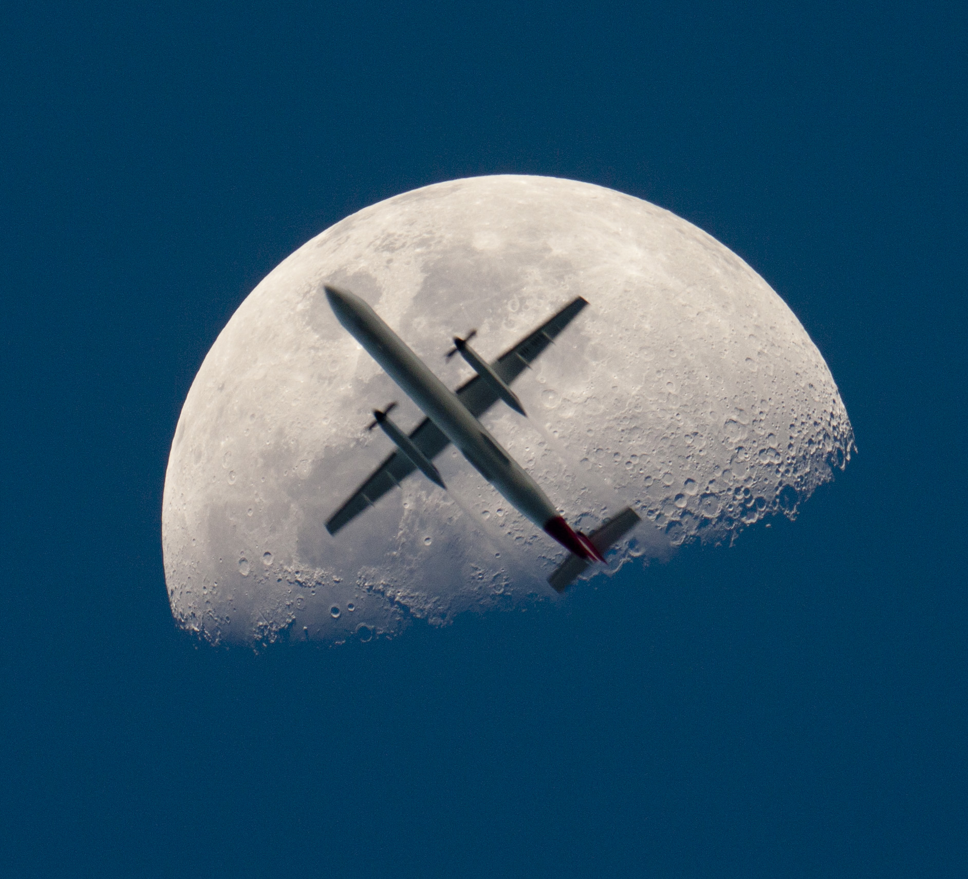 An Airplane in Front of the Moon. Credit & Copyright to Chris Thomas via APOD