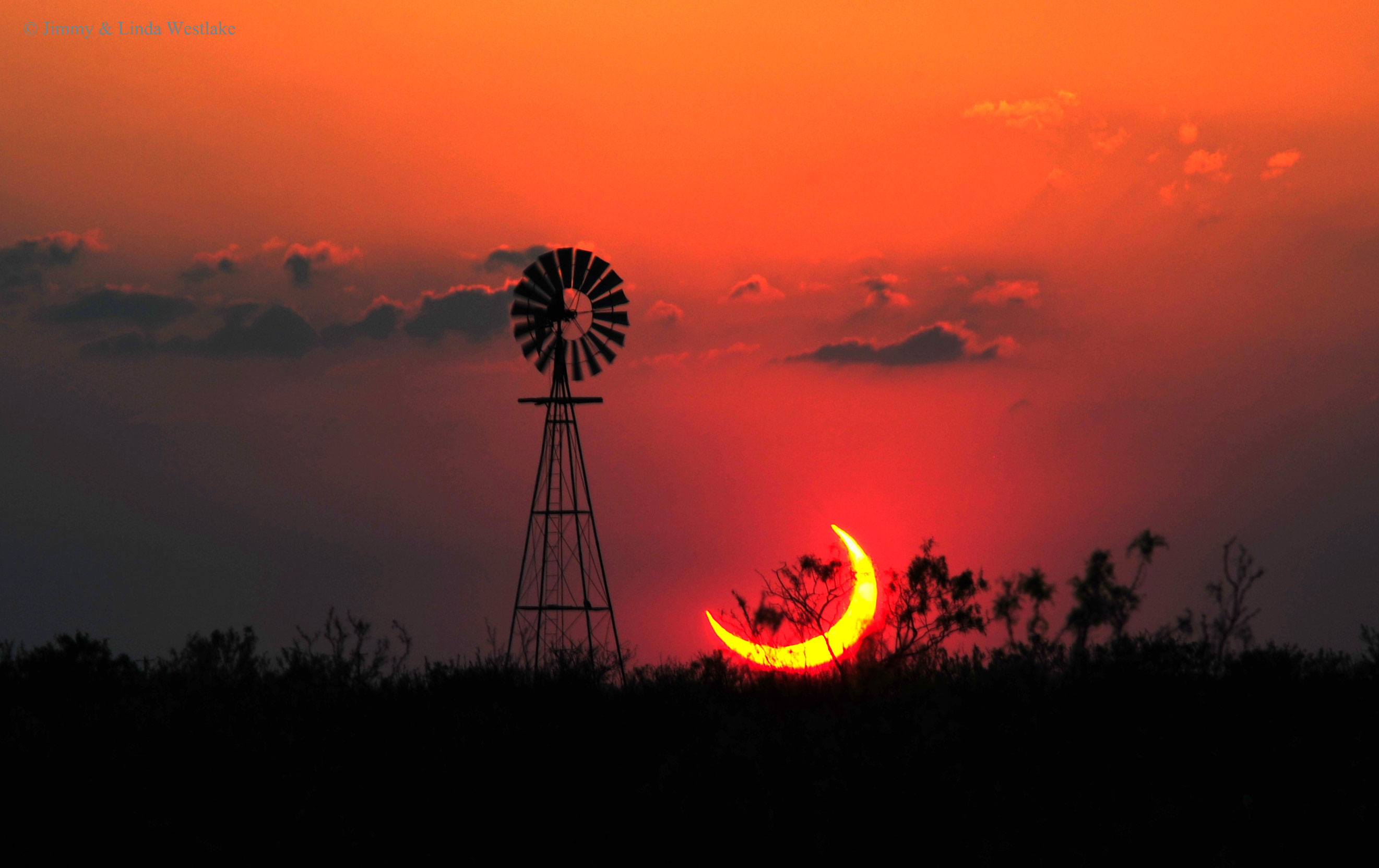 apod-2015-september-13-a-partial-solar-eclipse-over-texas