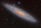 NGC 253: Dusty Island Universe