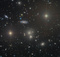 Within our own Milky Way galaxy, two bright, spiky stars stand