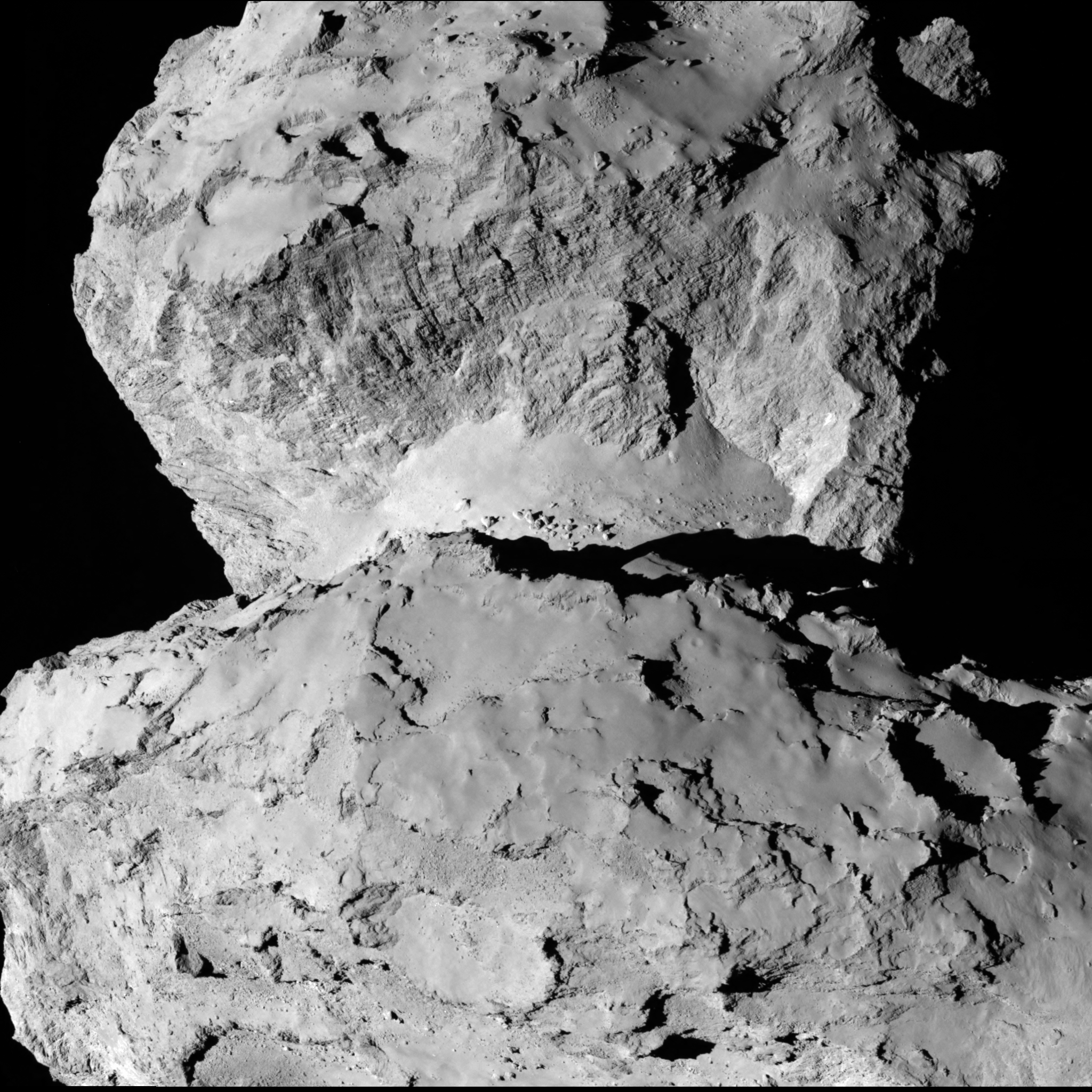 APOD: 2014 August 19 - Contrasting Terrains on Comet Churyumov