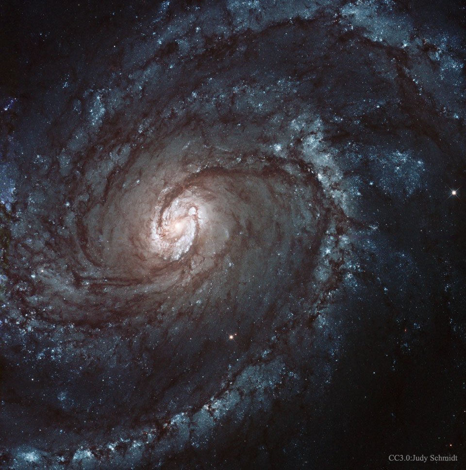 M100: una galaxia espiral de gran diseño