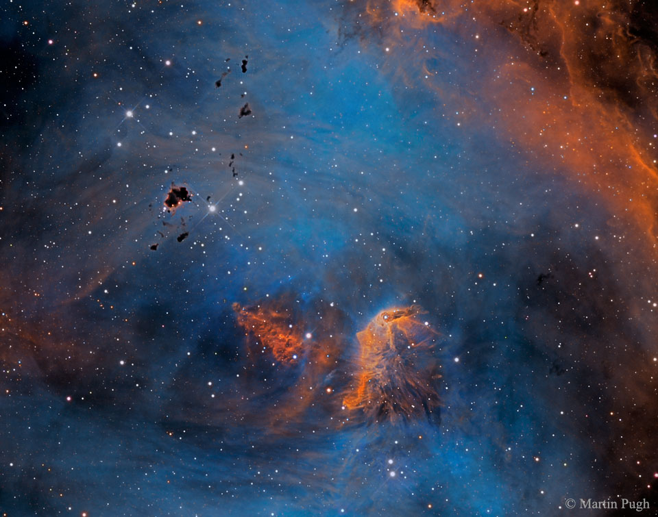 Estrellas y glóbulos en la nebulosa del Pollo Corredor