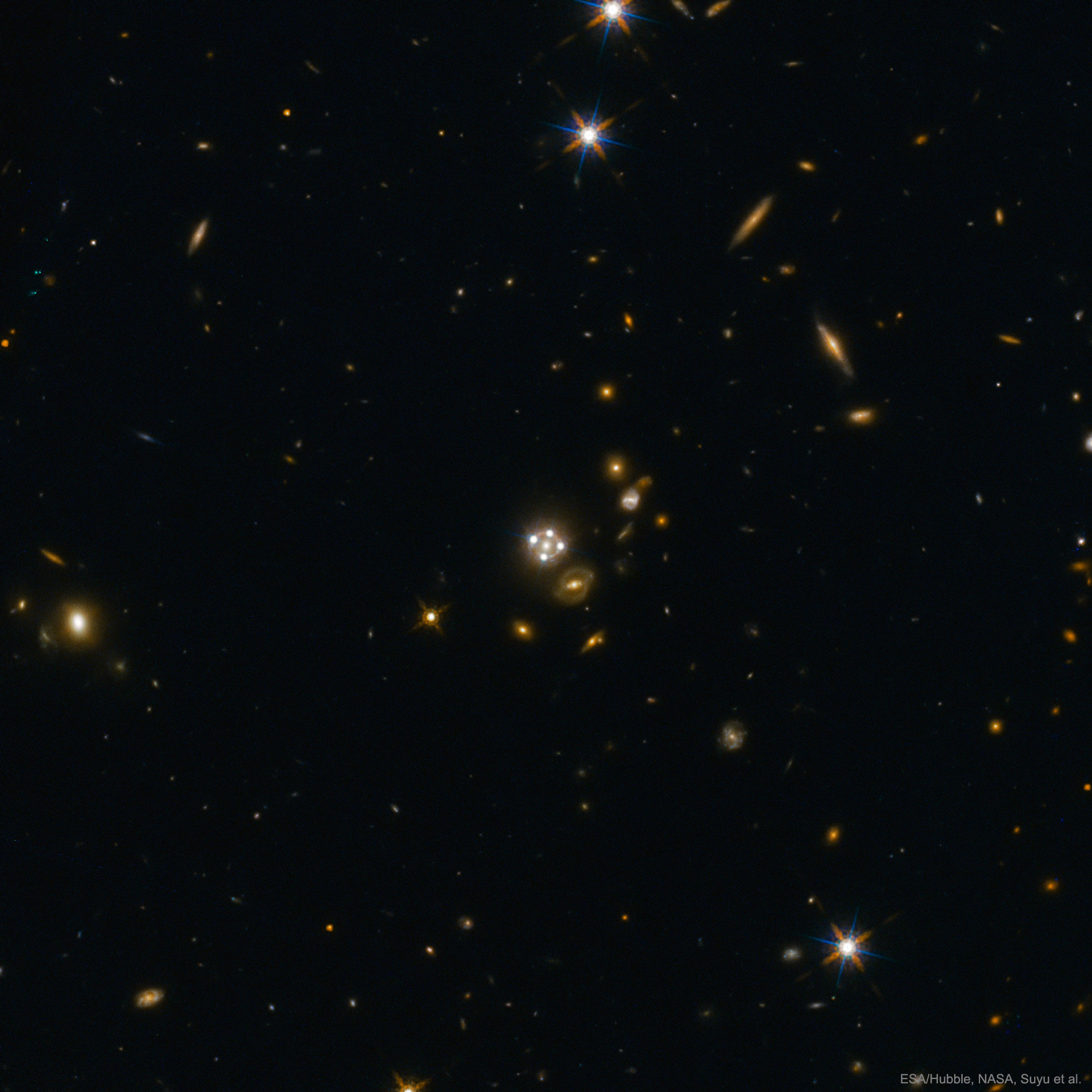QuadQuasarLens_Hubble_2020.jpg