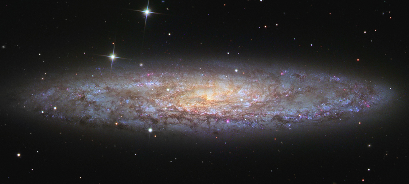 NGC 253: Universo isla polvoriento