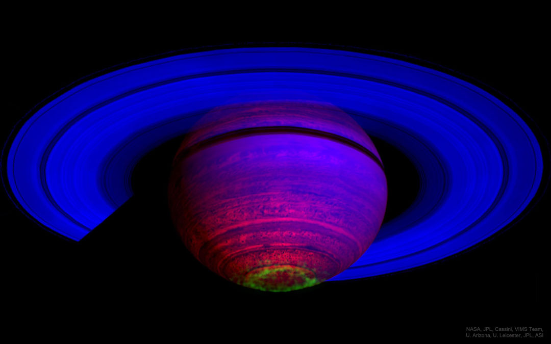 The picture shows the Saturn in infrared light with aurora as imaged by the
orbiting Cassini spacecraft in 2007.  
Please see the explanation for more detailed information.
