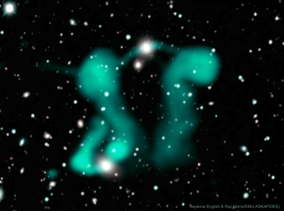 The picture shows the radio jets emitted from distant active galaxies.
The jets, made of electrons, appear like dancing ghosts.
Please see the explanation for more detailed information.
