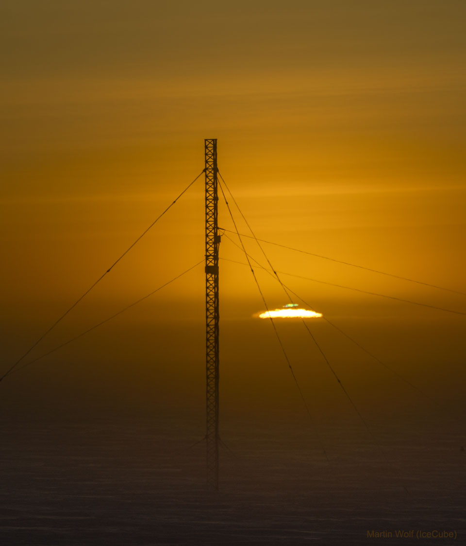 The picture shows the sun rising last week at the South Pole during equinox. A communications tower marks the foreground, and  the Sun shows a green flash at the top.  Please see the explanation for more detailed information.