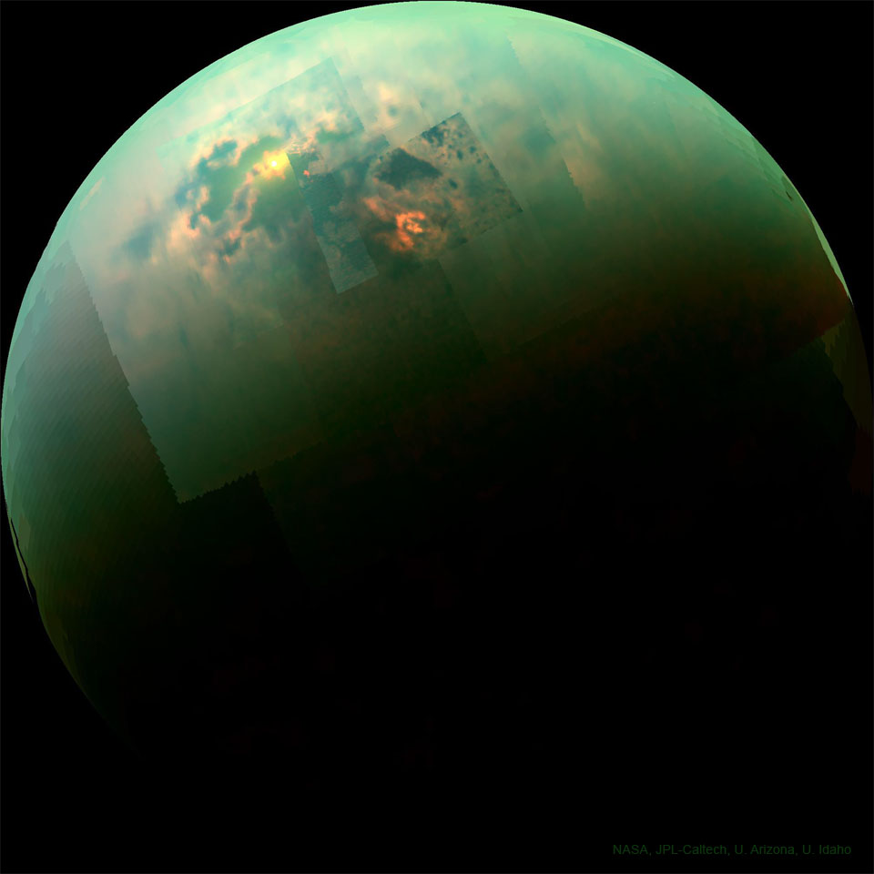 The featured image depicts Saturn's moon Titan as 
captured by the Cassini mission in 2014. The infrared
image is colored green and includes bright sunglint
from surface seas.
Please see the explanation for more detailed information.