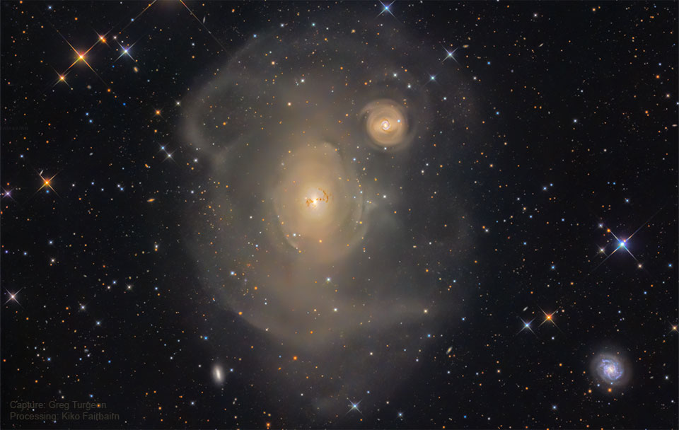 The featured image shows a deep image of the giant elliptical galaxy NGC 1316 featuring many concentric shells which embed a smaller galaxy. Please see the explanation for more detailed information.