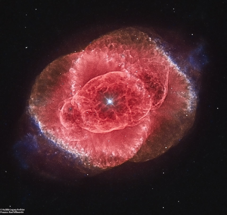 The featured image shows an image of the center of the  Cat's Eye Nebula as taken by the Hubble Space Telescope. A bright star is in the center surrounded by a complex red nebula.  Please see the explanation for more detailed information.