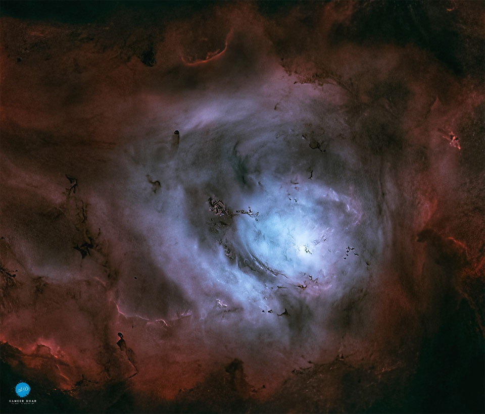 The featured image shows the center of the Lagoon Nebula
with many red gas ridges and dark dust pillars.
Please see the explanation for more detailed information.