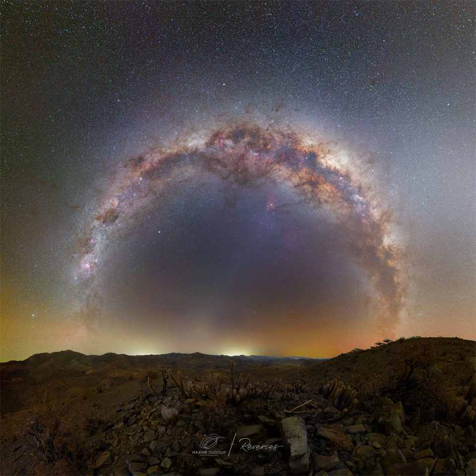 The featured image shows a circular ring of stars that is a
projection of the central band of our Milky Way Galaxy. In the foreground
are rocks and cacti from the high desert in Chile.
Please see the explanation for more detailed information.