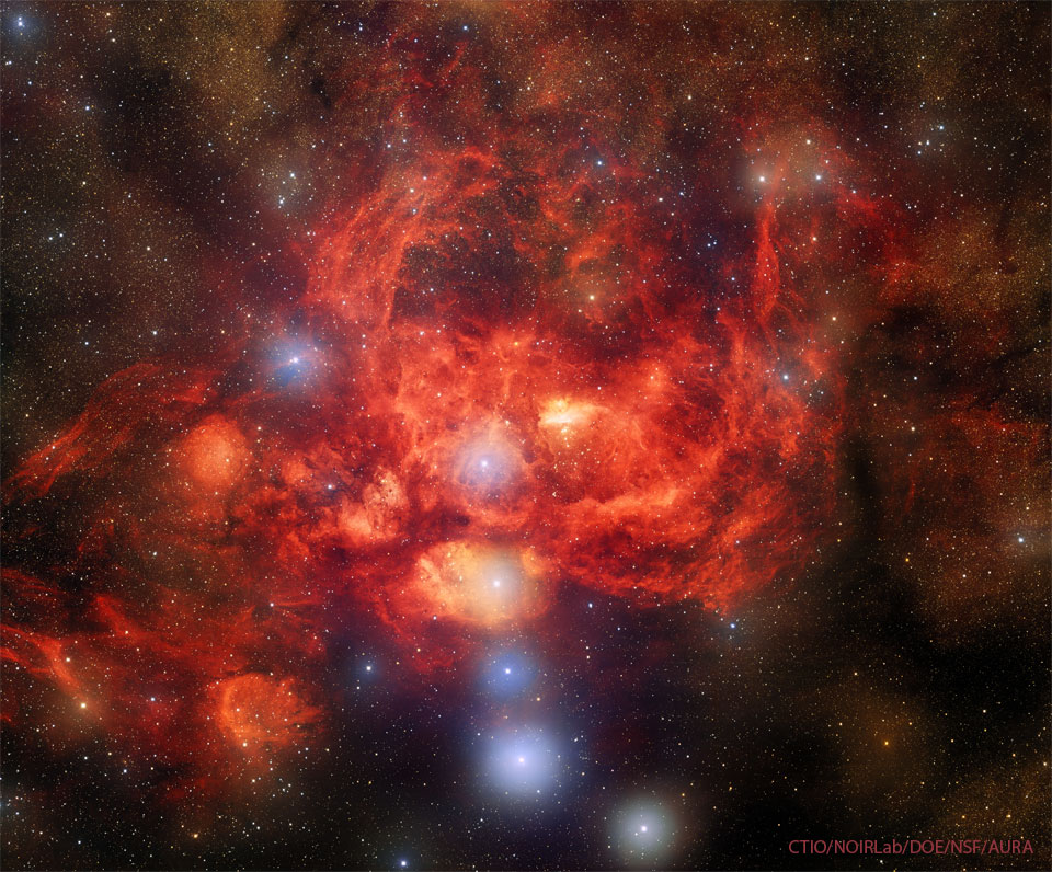 The featured image the Lobster Nebula, star field with a few bright blue stars surrounded by a red-glowing nebula that could be visualized as a lobster. Please see the explanation for more detailed information.