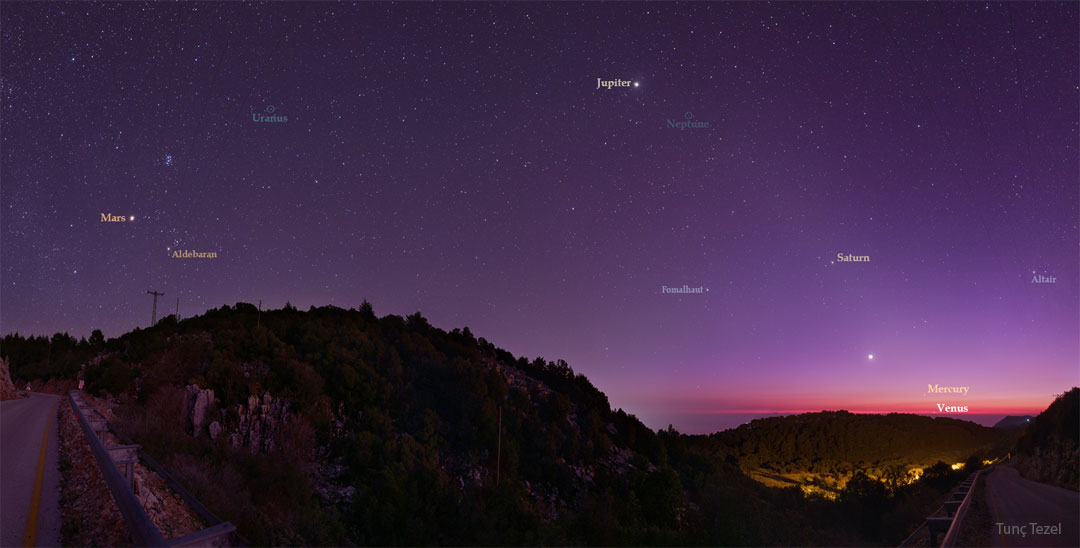 The featured image is a wide-angle image featuring a Turkish village
in the foreground and a sky containing off of planets in our Solar System
in the background. 
Please see the explanation for more detailed information.