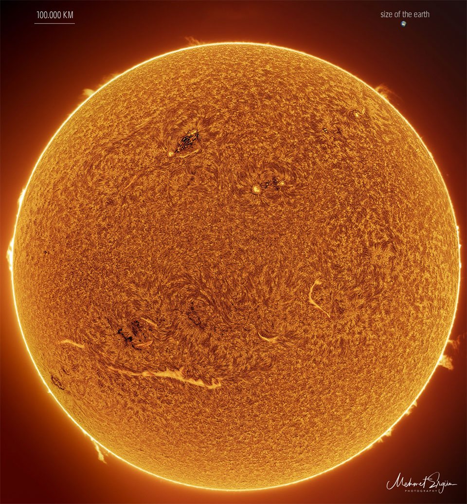 The Sun is pictured in a color that allows high detail. The
large orange ball has several bright streaks and a carpet-like
texture. Several prominences are visible around the edges.
Please see the explanation for more detailed information.