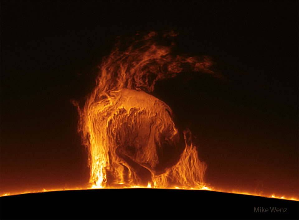 The edge of the Sun is shown sporting a large gaseous prominence
that looks like a science-fiction alien.  
Please see the explanation for more detailed information.