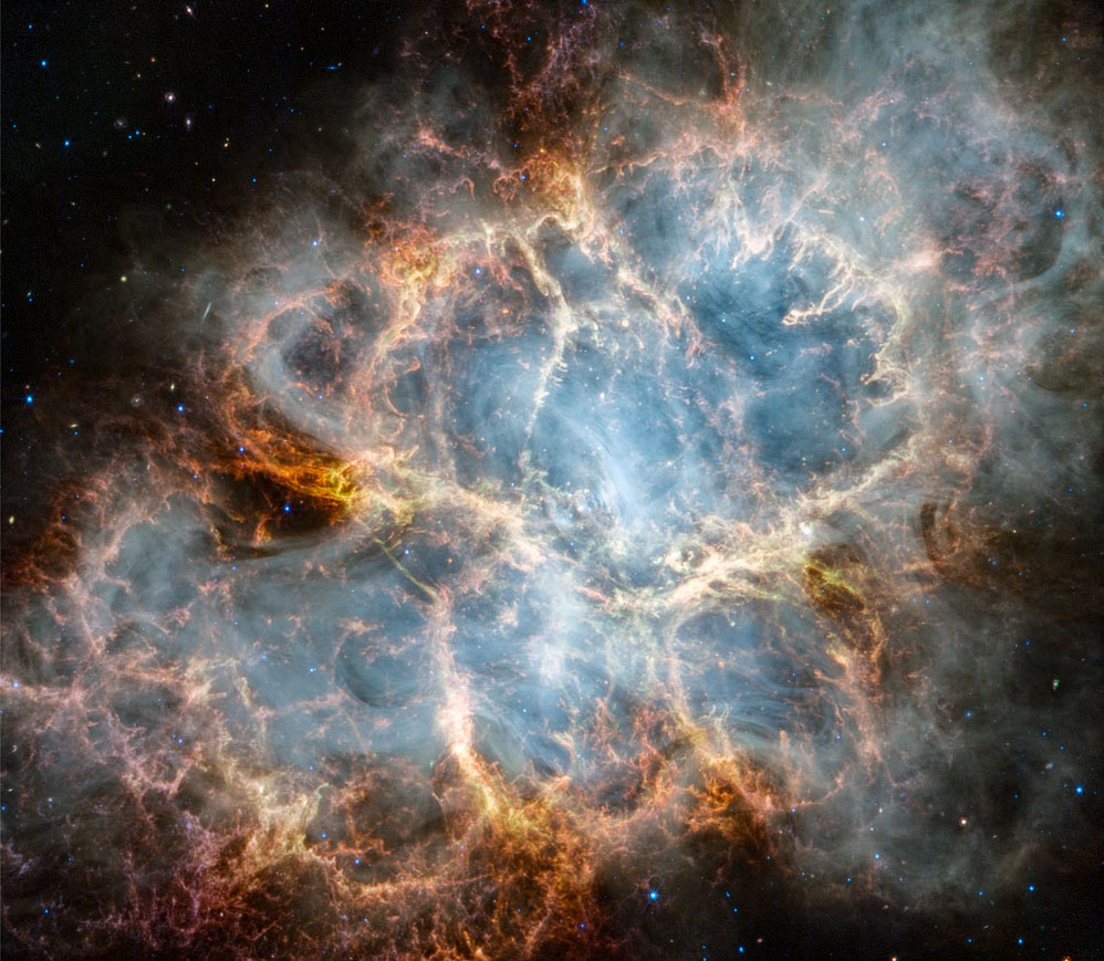 The Crab Nebula, M1, is shown as imaged by the 
James Webb Space Telescope. The rollover image is the same
Crab Nebula but this time from the Hubble Space Telescope.
The Webb image is in near infrared light, while the Hubble 
image is in visible light. 
Please see the explanation for more detailed information.