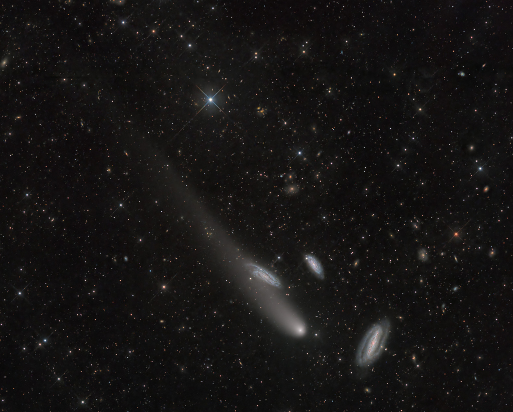 Three Galaxies and a Comet