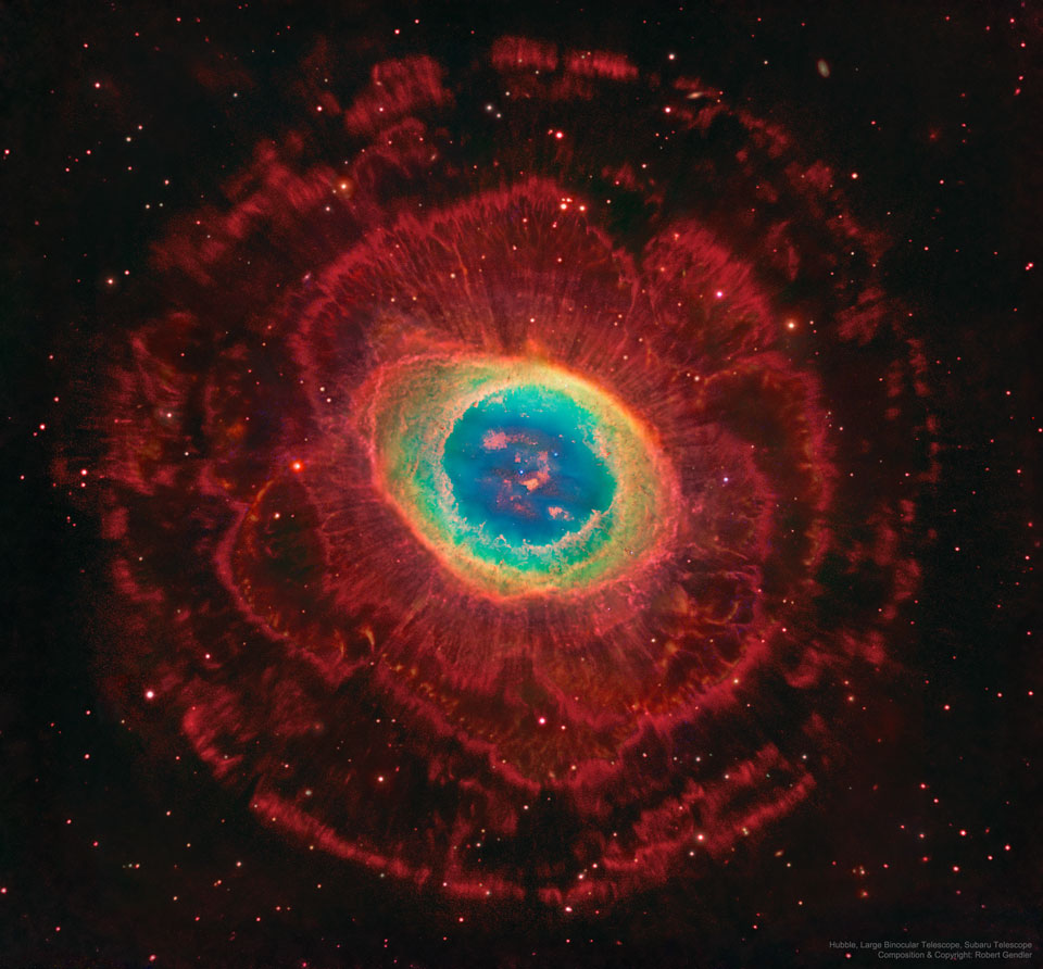 In the center is a colorful nebula, the most usually
seen part of the Ring Nebula. Several layers of red-glowing
gas with different structures are seen surrounding this
center.
Please see the explanation for more detailed information.
