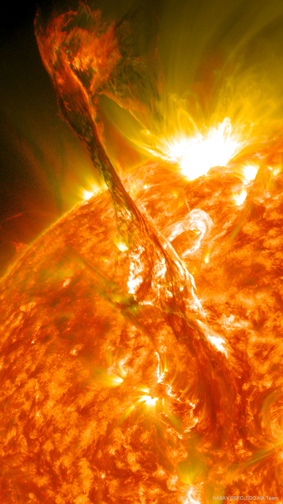 A large filament on the upper left is seen lifting 
away from the Sun, pictured on the lower right.
Please see the explanation for more detailed information.