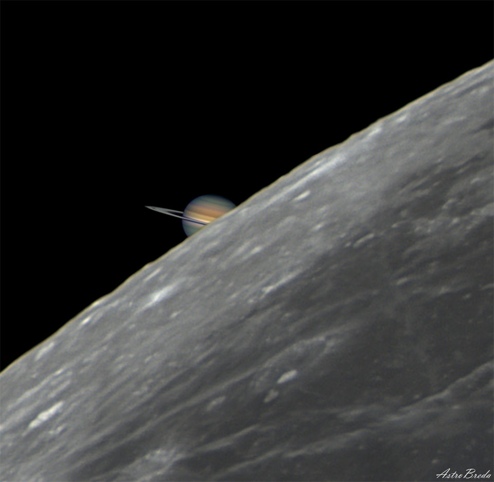 A picture of the edge of the Earth's familiar Moon   takes up the right part of the frame, while a partial image  of Saturn is visible just behind it on the left.   Please see the explanation for more detailed information.