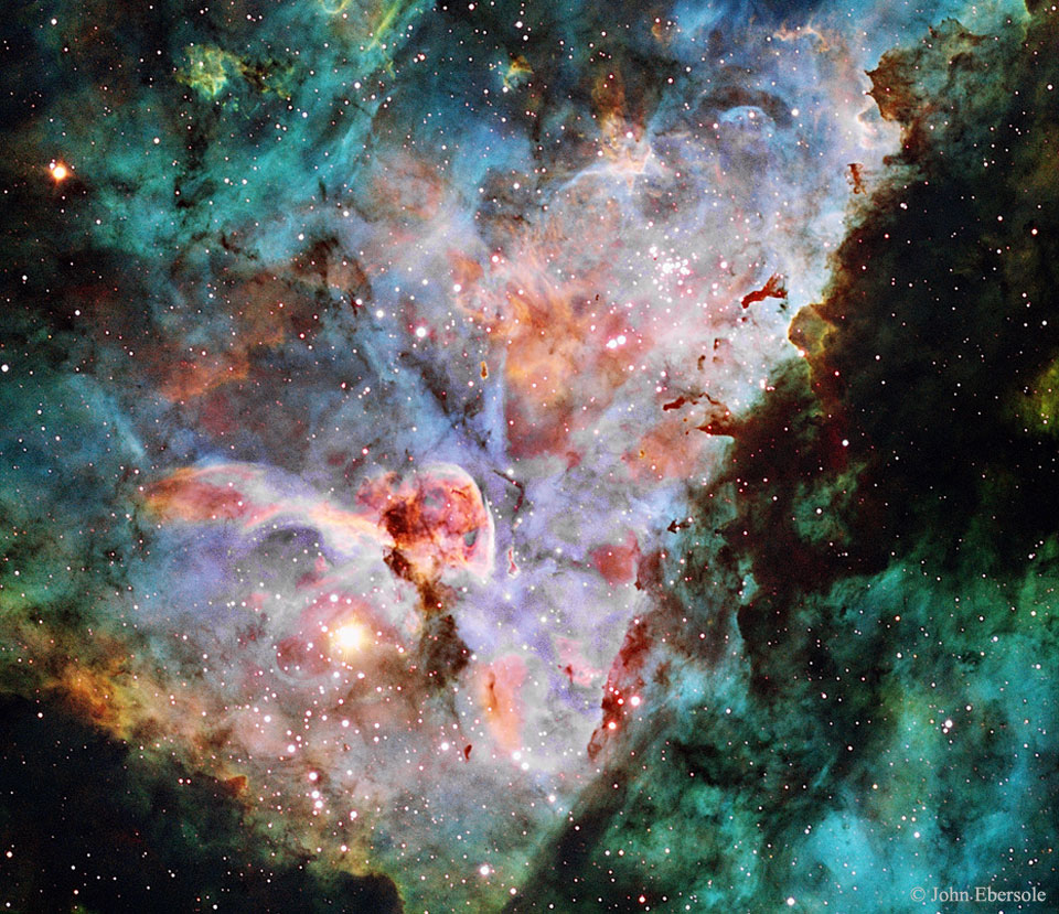 A picture of the gas and dust clouds that appear in the center of the Carina Nebula. 
Please see the explanation for more detailed information.