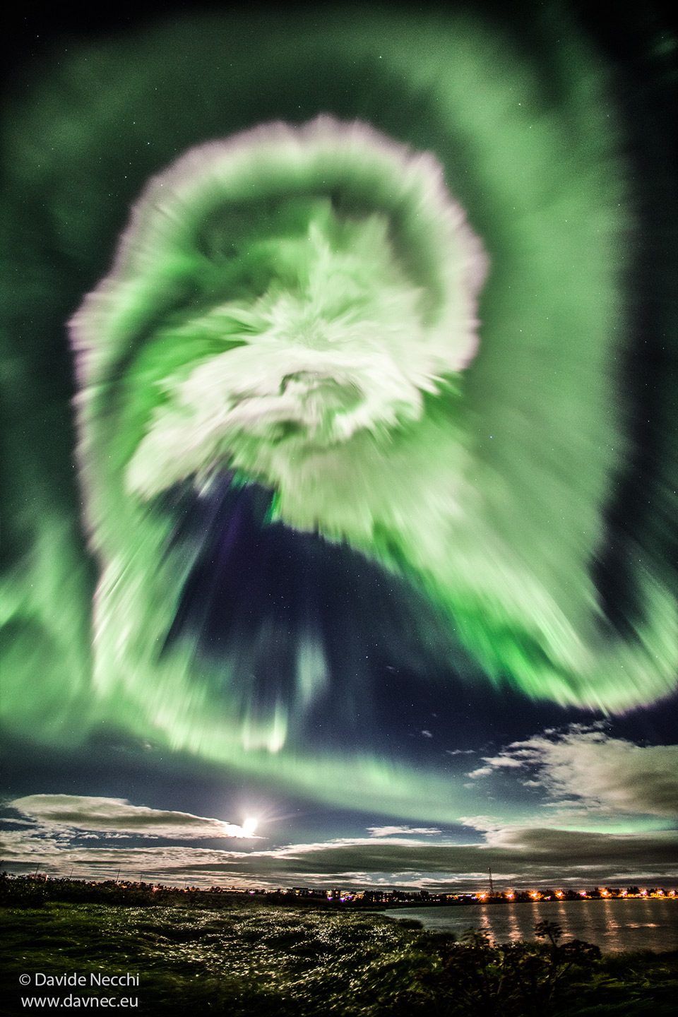 The picture shows a dramatic spiral-shaped aurora
over Iceland.
Please see the explanation for more detailed information.