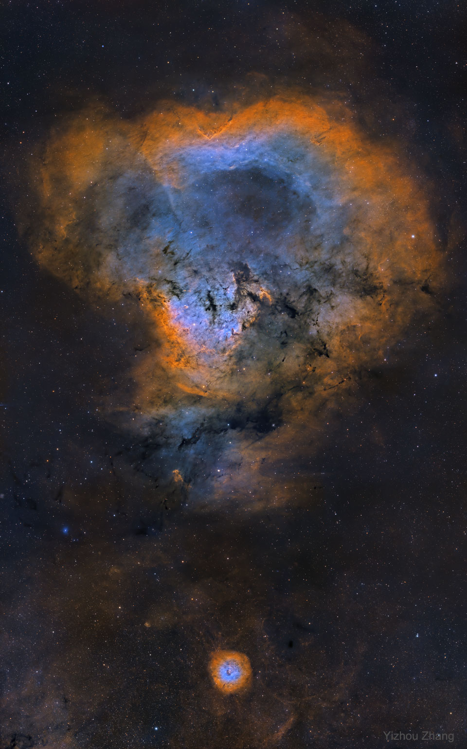 The picture shows a NGC 7822, known informally as
 the Cosmic Question Mark Nebula. 
Please see the explanation for more detailed information.