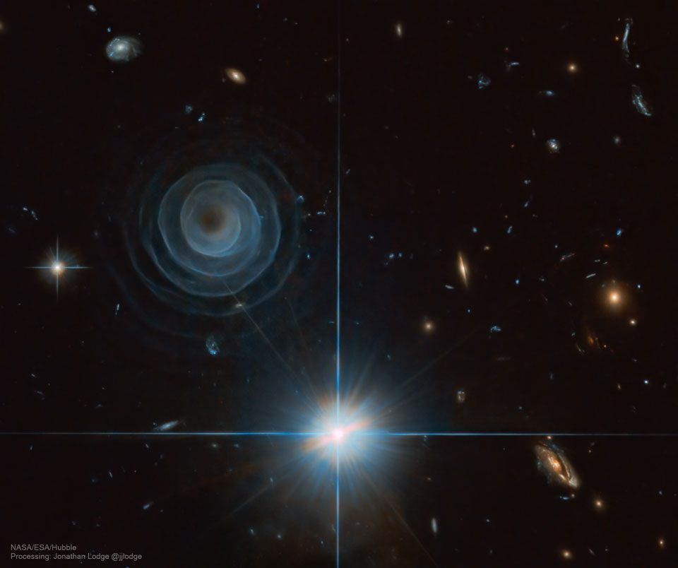 The featured image shows an unusual spiral structure
in the binary star system LL Pegasi as captured by the 
Hubble Space Telescope.
Please see the explanation for more detailed information.
