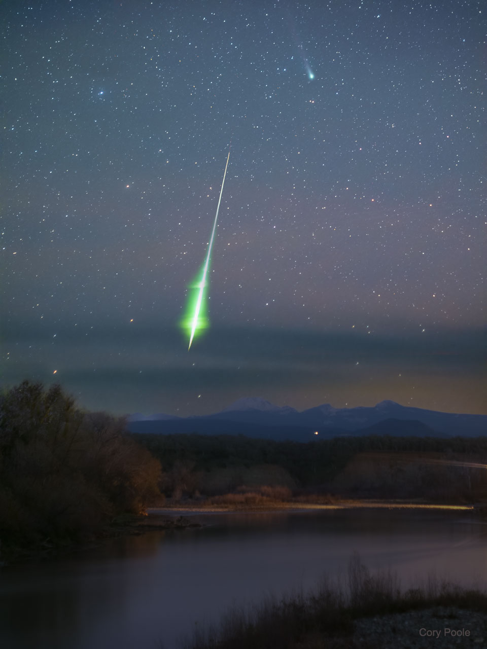 The featured image shows Comet Leonard in the backround
with a bright green fireball meteor in the foreground. The
image was taken from northern California, USA.
Please see the explanation for more detailed information.