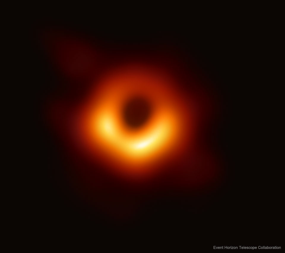 The featured image shows a black hole in 
unprecedented detail as first seen by the Event Horizon
in 2019. The featured black hole resides at the 
center of nearby galaxy M87.
Please see the explanation for more detailed information.
