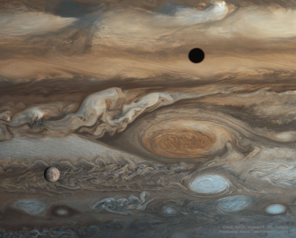 The featured image shows Jupiter's moon Europa in front
of Jupiter with many of Jupiter's clouds, including the Great
Red Spot, visible. 
Please see the explanation for more detailed information.