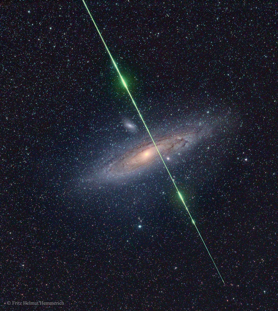 The featured image shows a bright green meteor trail
crossing before the distant Andromeda galaxy. 
Please see the explanation for more detailed information.